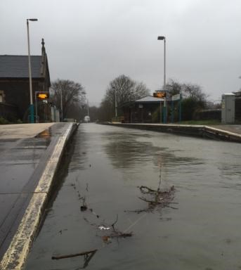 Work continues to fix flood damaged railway in North Wales: Flooding at North Llanrwst station