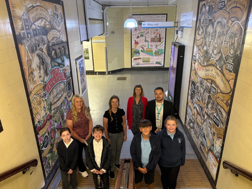 Councillor Ella Billiald, artist Katie O'Sullivan, CRP officer Sarah Davison and Dan Gillard (Chiltern Railways) with school pupils and the murals