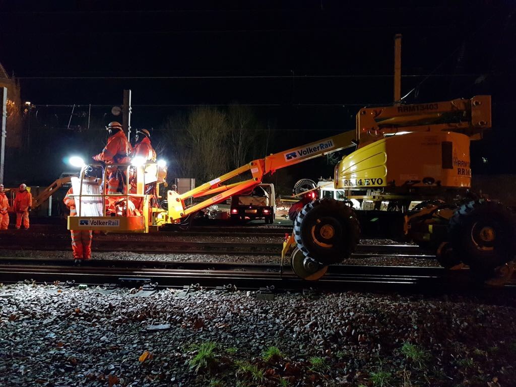 Team Orange working to connect overhead power lines at Preston