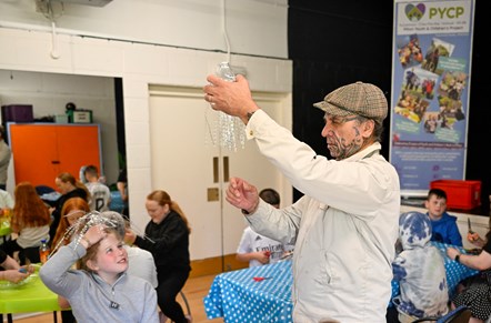 Artist George Nuku working with young people from the Pilton Youth and Children's Project and Granton Youth on components for the artwork Bottled Ocean 2123, an imagined underwater landscape made from recycled plastic. The work will go on show in the exhibition Rising Tide: Art and Environment in Oceania, which opens on August 12 at the National Museum of Scotland. Image credit: Neil Hanna.
