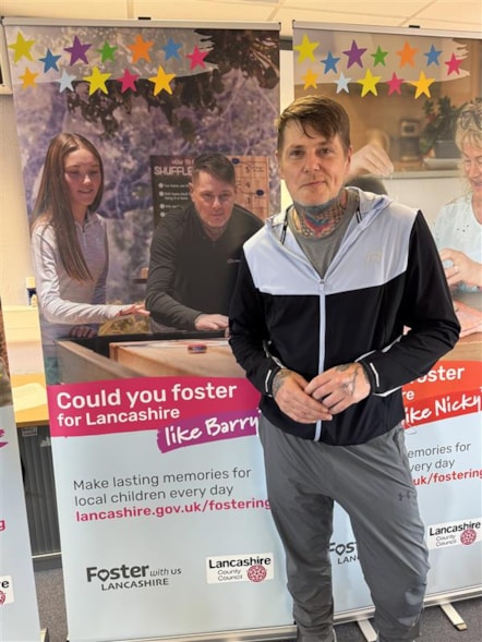 Foster carer Barry with his campaign poster