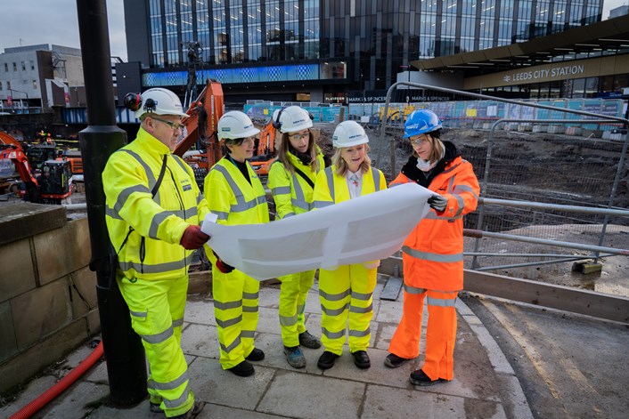 Leeds Station Sustainable Travel Gateway: West Yorkshire Mayor Tracy Brabin and Cllr Helen Hayden are shown the plans for improving Leeds City Station's main entrance by Network Rail's Anna Weeks, accompanied by Lucy  Pitts O'Connor and Tony Milburn of constructor partner Balfour Beatty.