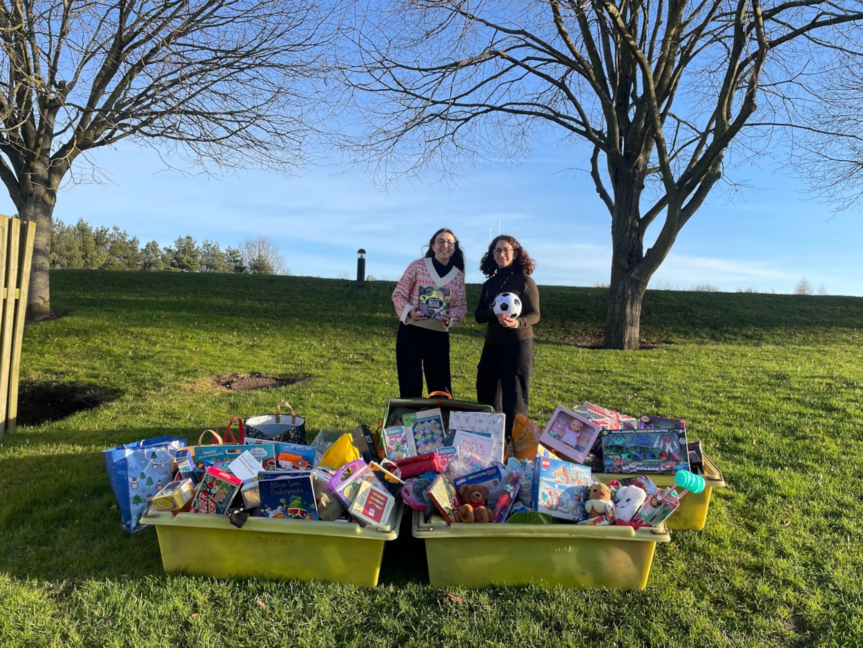 CFL Christmas Gifting 2: Gift collection at Grammar School at Leeds. Pictured, from left, Rowan Beaumont, of Child Friendly Leeds, and Sophia Harris, of Grammar School at Leeds.