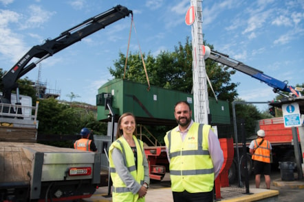 Kayleigh Ingham and Andrew Cullen look on as the fuel tank is removed 3