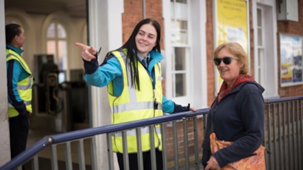 Female colleague Emily, platform staff helping passenger at Tunbridge Wells station (3)