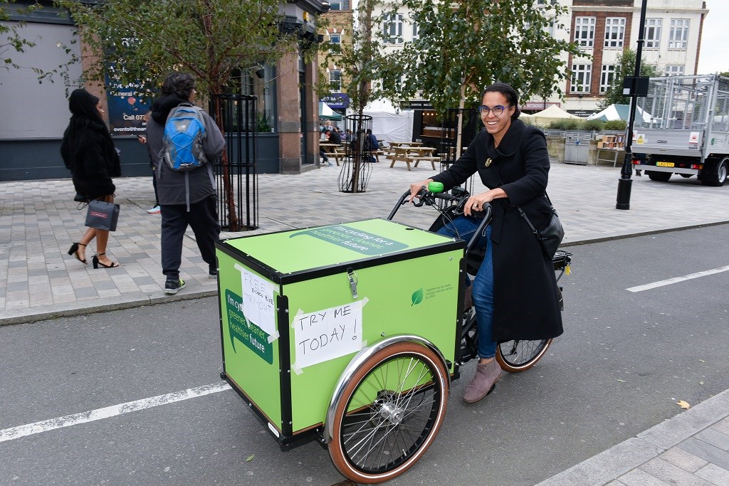 Cllr Comer-Schwartz tries out one of the council's new cargo bikes