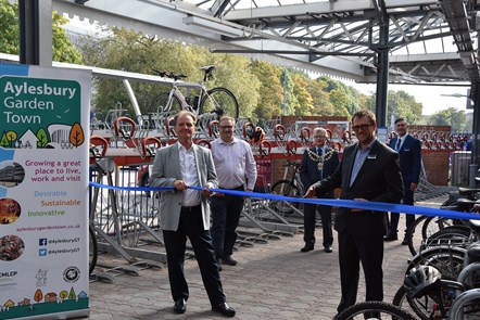 Representatives open the new bike racks at Aylesbury Station