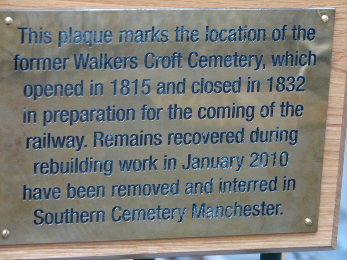 Walker's Croft cemetery: Close-up of the words on a plaque marking the former cemetery.