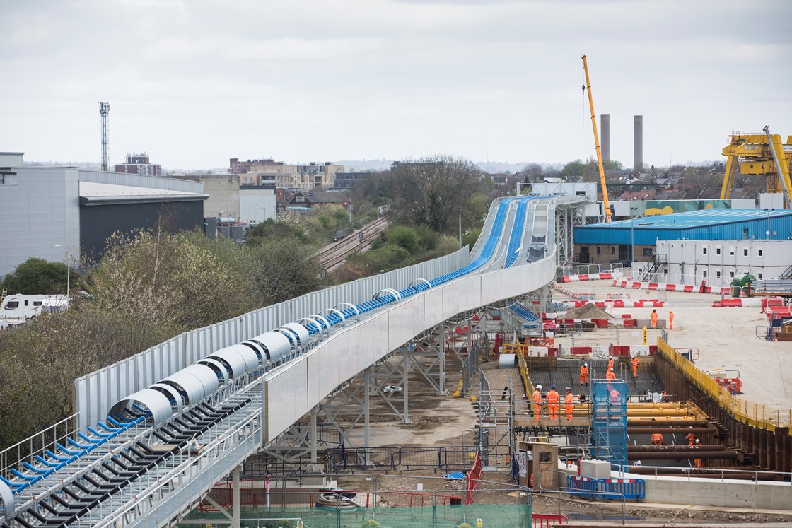 West London spoil conveyor network - Atlas Road: The conveyor network has three spurs, serving the Old Oak Common station site, the Victoria Road Crossover box site, and the Atlas Road site. At Atlas Road, the conveyor will be used to remove spoil from the excavation of a logistics tunnel running from Atlas Road to Old Oak Common. The conveyor will then be extended through the logistics tunnel and will remove material from excavation of the Euston tunnel, further reducing the impact on the local road network. 

Image from April 2022 during construction of the  conveyor network. 

Tags: Construction, Conveyor, Spoil, Tunneling, SCS JV, Environment