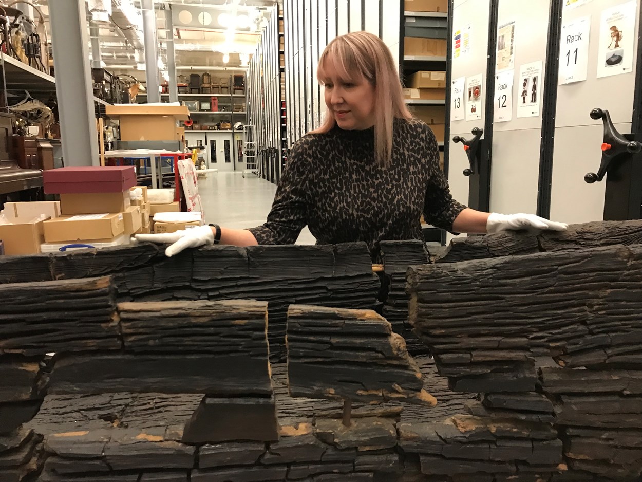 Gigglewick Tarn logboat: Kat Baxter, Leeds Museums and Galleries curator of archaeology with the centuries-old carved logboat, which dates from the 1300s. The  watercraft had lain beneath the soil for more than 500 years before being discovered by Joseph Taylor in 1863 while he was digging some drainage works near Giggleswick Tarn in North Yorkshire.