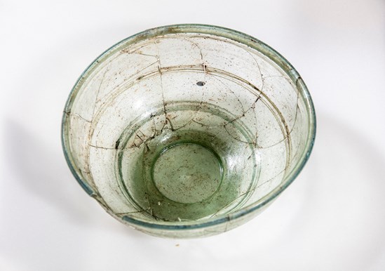 Glass bowl, possibly Roman, uncovered during HS2 excavations of an Anglo Saxon burial ground in Wendover, Buckinghamshire: A tubular rimmed glass bowl found in a burial thought to be made around the turn of the 5th century and could have been an heirloom from the Roman era.

Tags: Anglo Saxon, Archaeology, Grave goods, History, Heritage, Wendover, Buckinghamshire