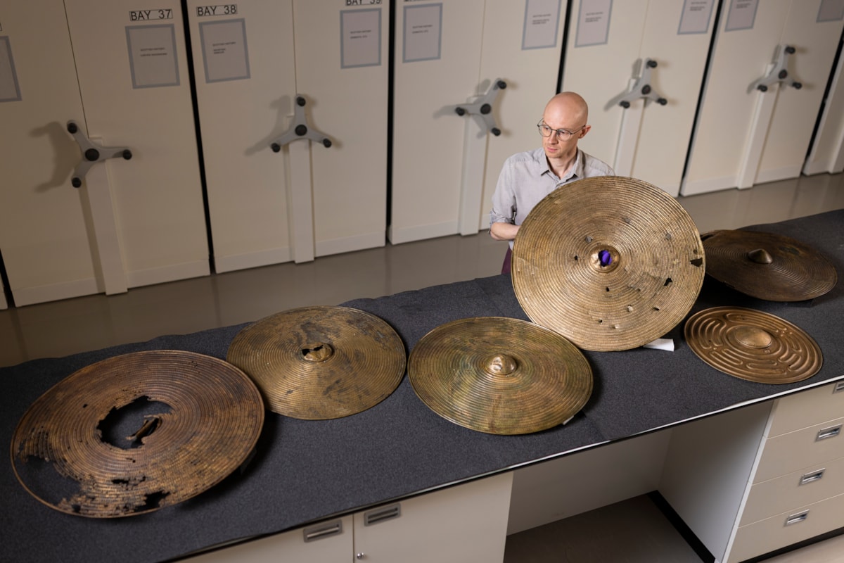 National Museums Scotland curator Dr Matthew Knight with the Bronze Age shields. Photo © Duncan McGlynn (4)