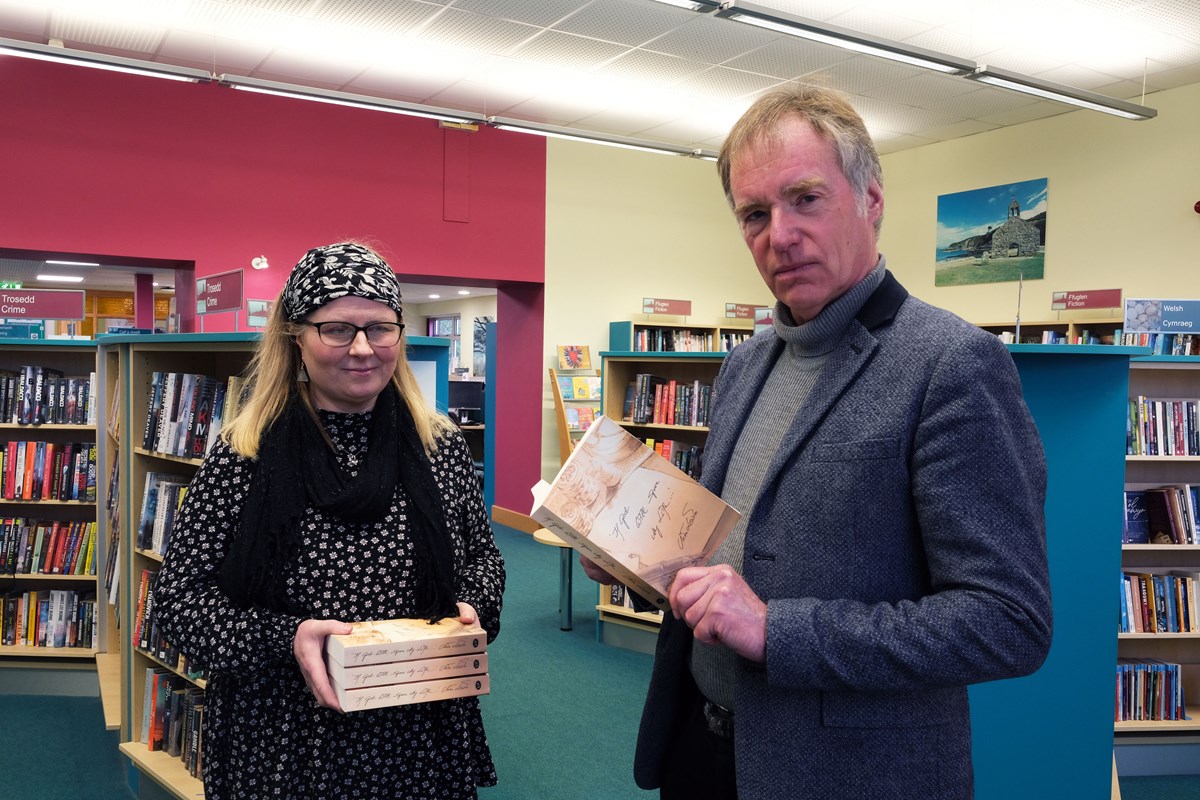 Author Mike Lewis with Tracey Johnson, Manager of Fishguard Library.
