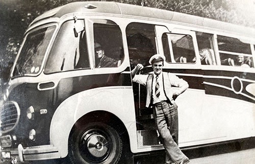 Driver and vehicle in the mid 1950s