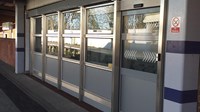 Sliding doors moment as customer waiting areas at Eltham station fully covered for the first time: Eltham stn covered waiting area