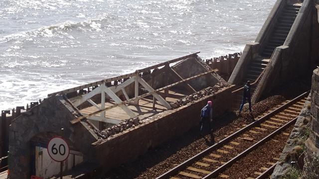 People trespassing on the railway line east of Dawlish station underneath Coastguard footbridge