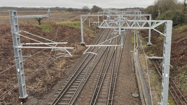 Safety warning as new electric power lines go live between Wigan and Bolton: Newly installed gantries and overhead wires