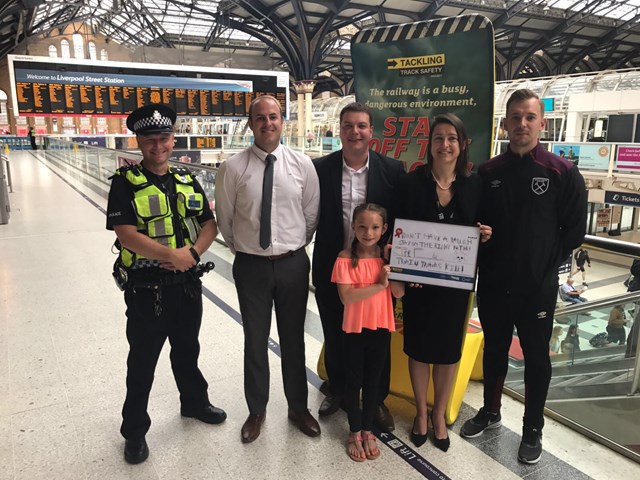 Nine-year-old girl from Stanford-le-Hope designs new national railway safety campaign: Winner Summer with representatives from Network Rail, BTP and West Ham United Foundation Club
