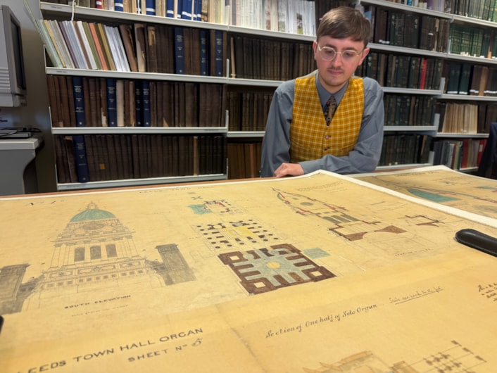 Leeds Town Hall clock tower: Archives assistant Alex Pearson with the plans for the Leeds Town hall clock tower.
Created in 1857, a year before the building was opened by Queen Victoria, the elaborate illustrations are part of the collection at West Yorkshire Archives Service and include the classical stonework and emblematic owls adorning the tower exterior.
They were prepared as part of the “articles agreement” put together by contractors Addy and Nicholls, who took on the mammoth task of constructing the tower.