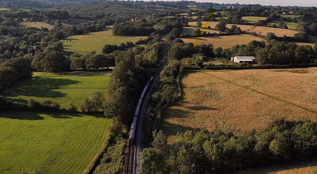 Tunbridge Wells to Hastings line to close for seven days this October half term as Network Rail engineers tackle landslip prone sites: A Southeastern train winds its way through Church Settle, where Network Rail will be working this October