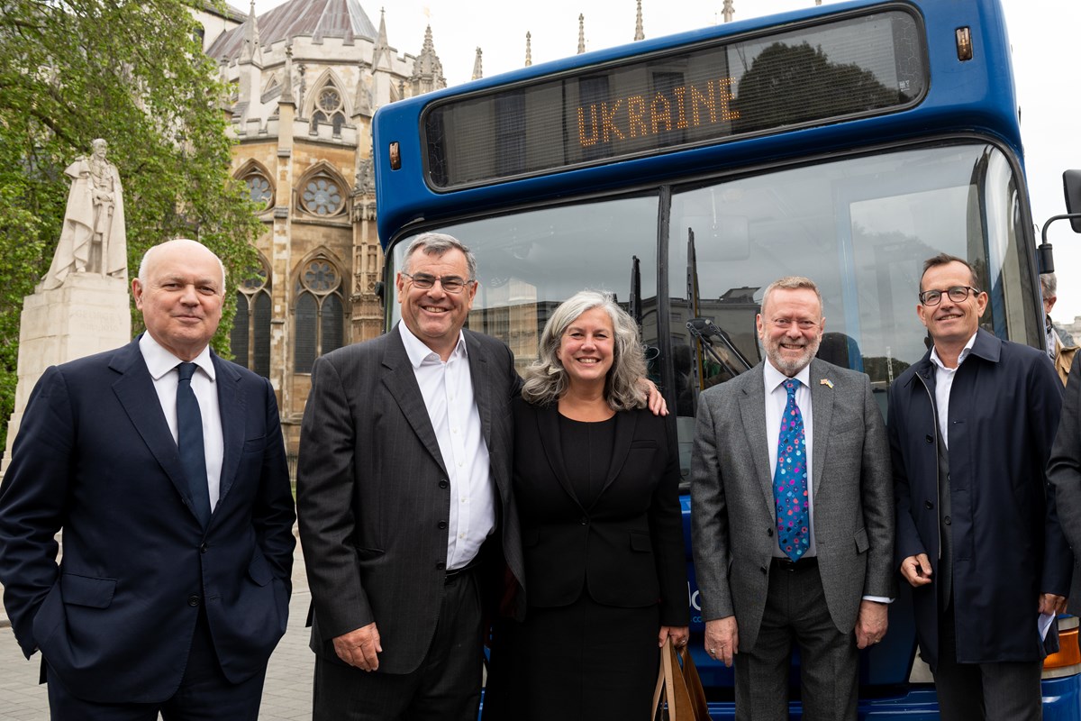 A hospital bus donated by The Go-Ahead Group to Ukraine is presented outside parliament.
Left to right: Iain Duncan Smith MP; Mike Bowden, chair of Swindon Humanitarian Aid Partnership; Heidi Alexander, Labour candidate for South Swindon; Lord Collins of Highbury; Christian Schreyer, Chief Executive