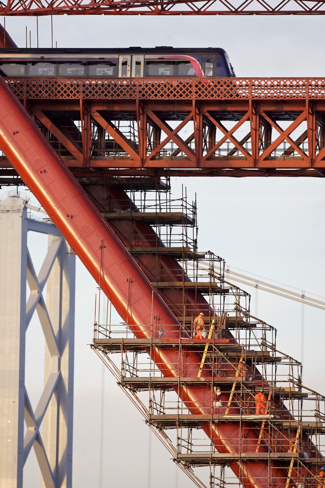 Forth Bridge December 2011: Pic008: The work had to take place near the live railway without disrupting train services. Over 200 trains, including tens of thousands of passengers, use the bridge every day.
