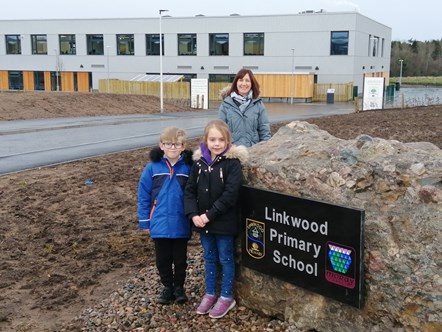 Linkwood Primary School Head Teacher Fiona Stevenson with P3 pupil William Forbes and P2 pupil Louise Buchan