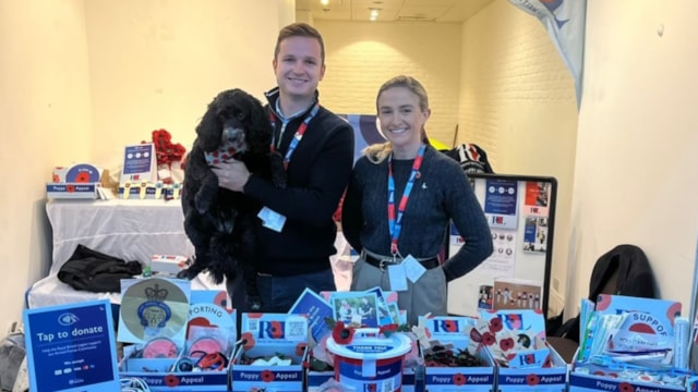 Forces couple at Network Rail in quest to help ex-service personnel find rail industry jobs: Garry and Charlotte volunteering at a Royal British Legion fundraiser (with their cockapoo Bonnie) – Network Rail
