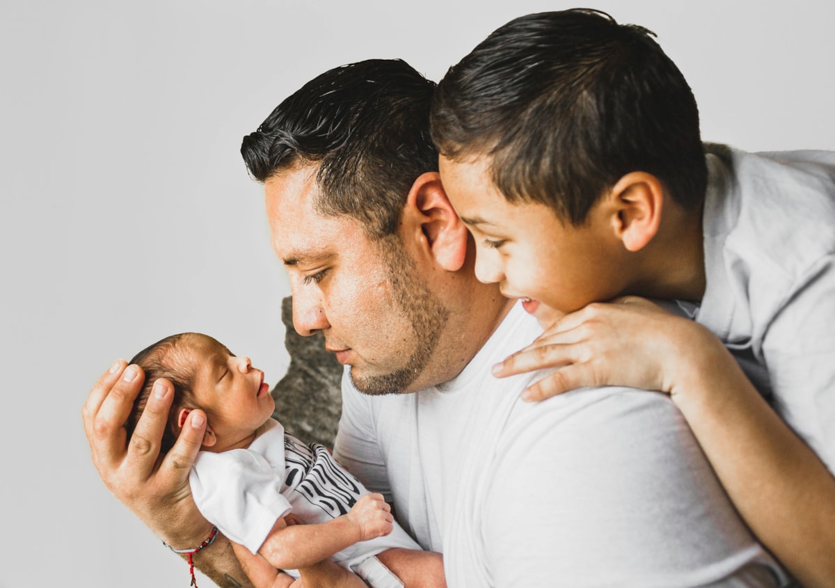 Dad with young children