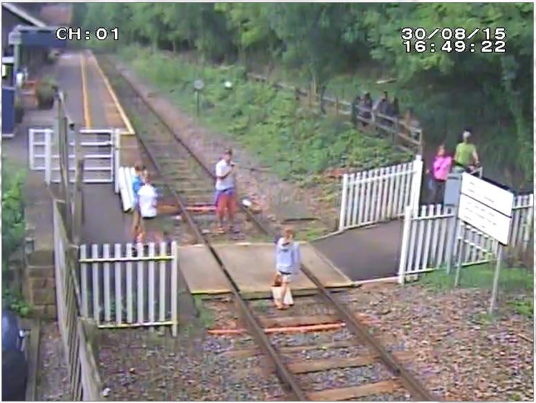 Matlock Bath - Man takes a picture of child on the track