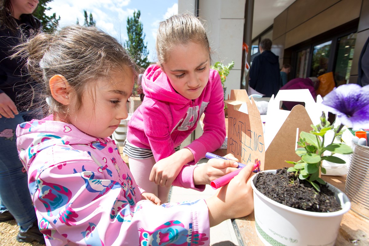 Children enjoy gardening activities at the grand opening of the Caledonian Clock Tower, on June 8 2019