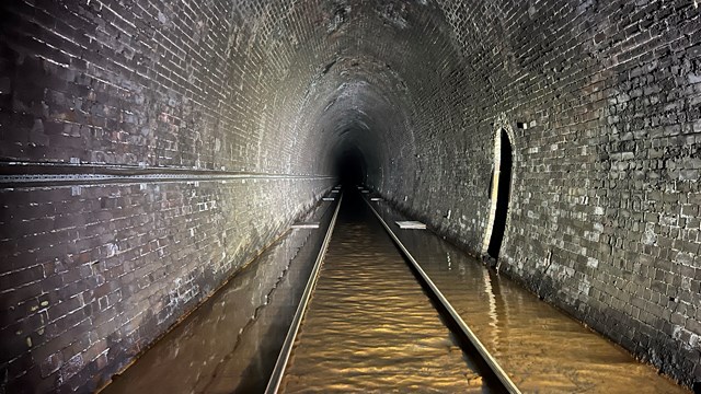 Flood water in Whitehaven tunnel containing iron ochre: Flood water in Whitehaven tunnel containing iron ochre