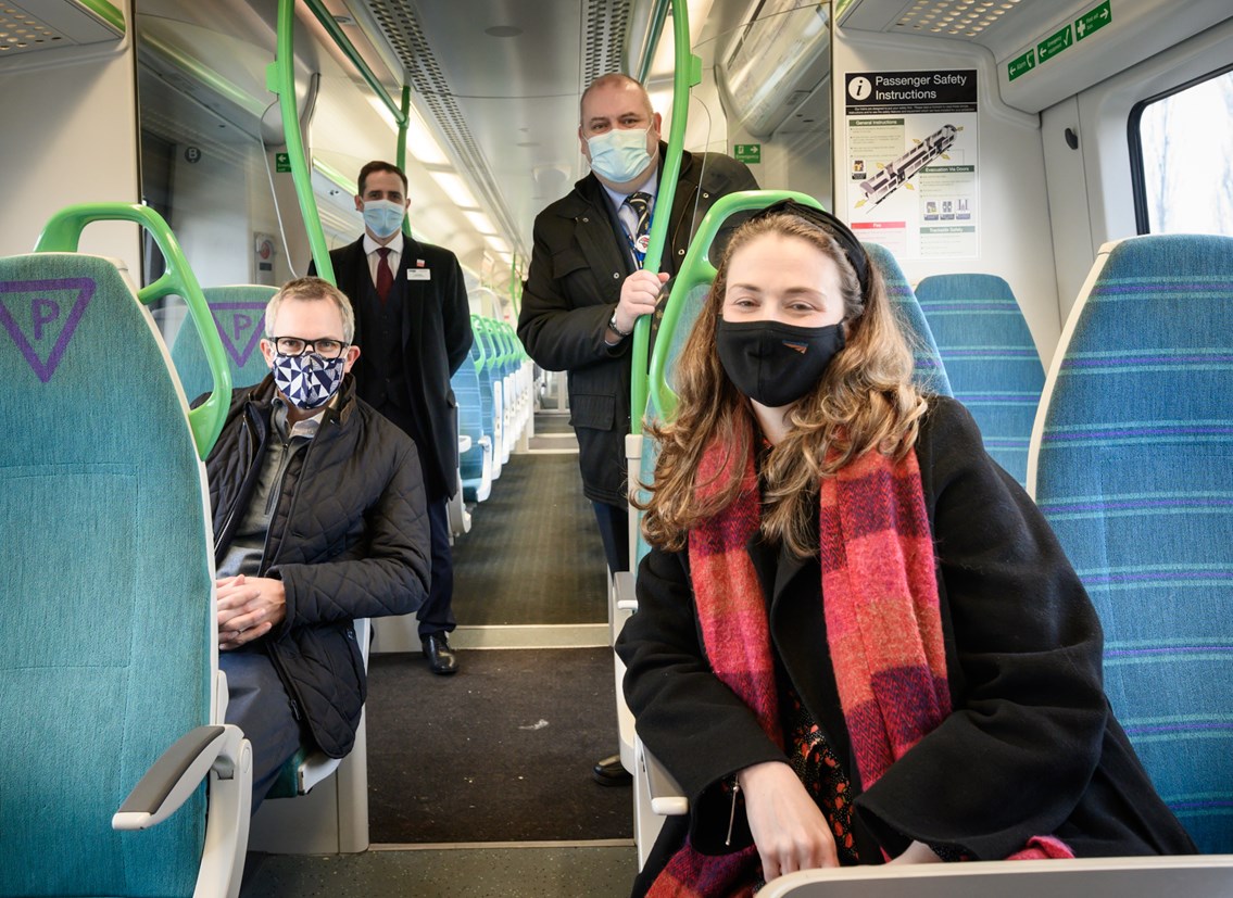 Kings Lynn 11 December eight carriage train event (12): Riding the eight-carriage train to Cambridge are (left to right) James Wild MP, Rob Mullen Great Northern and Thameslink Train Services Director, Brian Long Leader of King's Lynn Council, Sarah-Jane Crawford Network Rail Principal Programme Sponsor Anglia