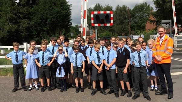 Joshua Hall from Network Rail with students from Blakedown CofE school
