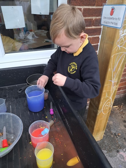 Pupil Thomas enjoys painting at the Orchard, a new SEND unit at Thornton Primary School-2