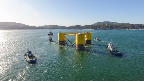 Floating Wind Centre of Excellence to research key cost saving technology for offshore wind farms: Image courtesy of Principle Power - WindFloat leaving Lisnave dock after construction (3 ) near Setúbal, Portugal