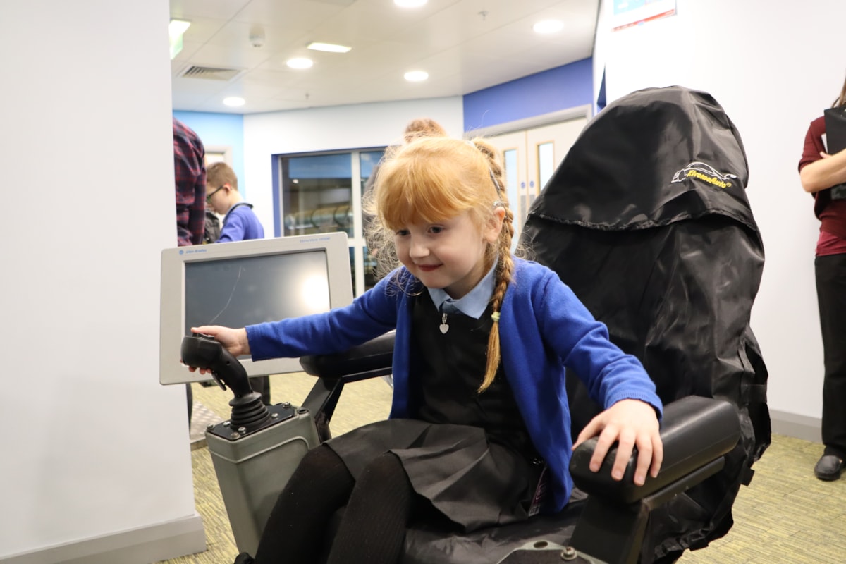 One young pupil enjoying one of the interactive activities