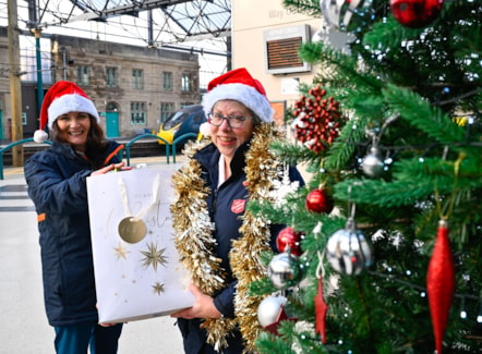 Left to Right: Diane Forrester (Avanti West Coast Customer Service Assistant) and Captain Mel Scoulding (The Salvation Army) with gift donations at Carlisle station.