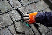 Demonstration of maintenance of a traditional slate roof: (c) Historic Environment Scotland