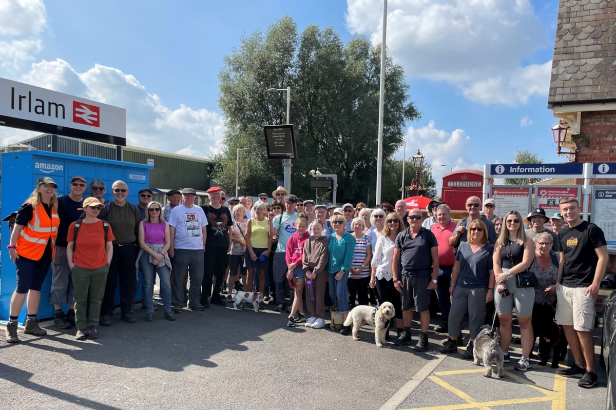 Members of the local community meet up at Irlam station to take part in a walk