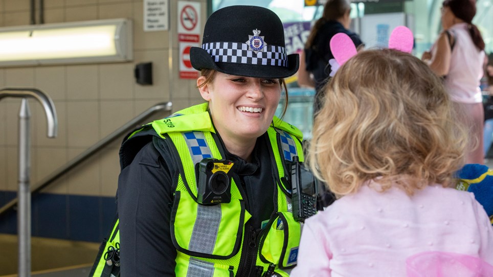 Officer talking to a child - Hero Image