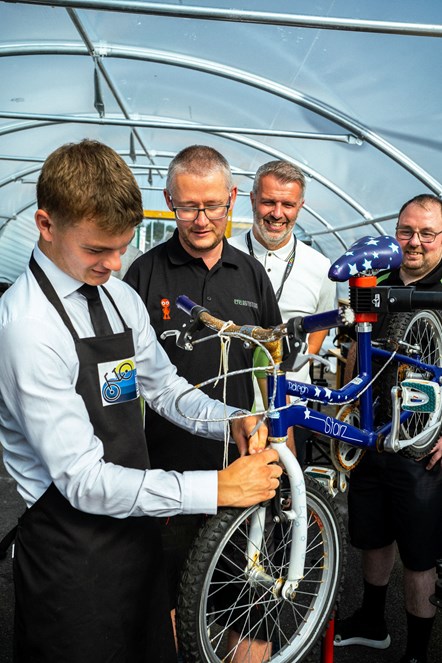 Alan and Derek from Cycle Station with Andrew Black from Vibrant Communities and Kyle from Stewarton Academy