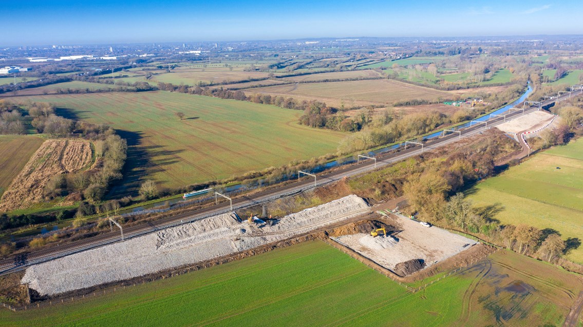 Drone shows Victorian-built railway getting 21st century upgrade: Full wide shot of 1km stretch of railway being strengthened at Hopsford Hall Spring 2021 (1)