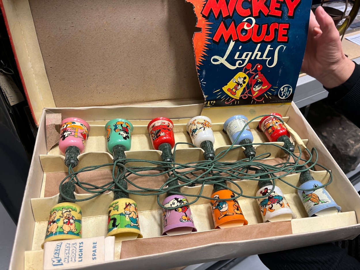 Biscuit messages: Also part of the collection is a set of Mickey Mouse Christmas tree lights as well as some brightly coloured glass baubles manufactured by Morley’s Briteglass Ltd. The Jay-Tee brand glass Christmas tree decorations were owned by local couple Herbert and Maud Storer who married in 1944.