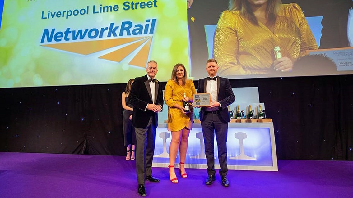 BBC Newsreader Huw Edwards presenting Lime Street team with award (Picture Credit Rail Magazine)
