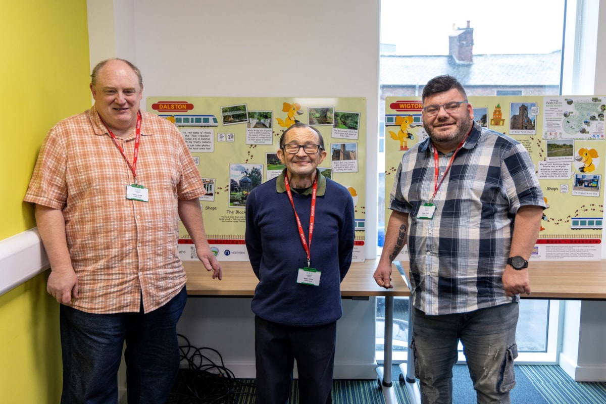 Image shows project participants working on Makaton information panels (2)