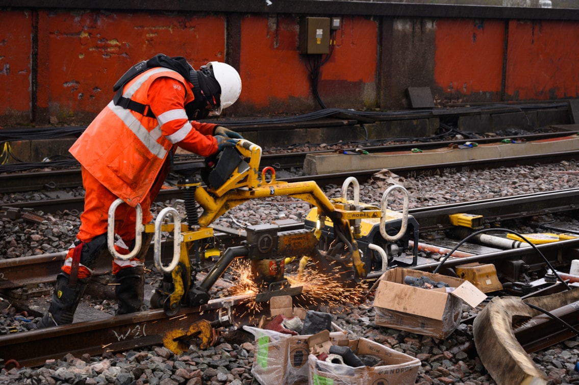 Grinding the new rails over a joint during Piccadilly corridor track upgrades Feb 2026