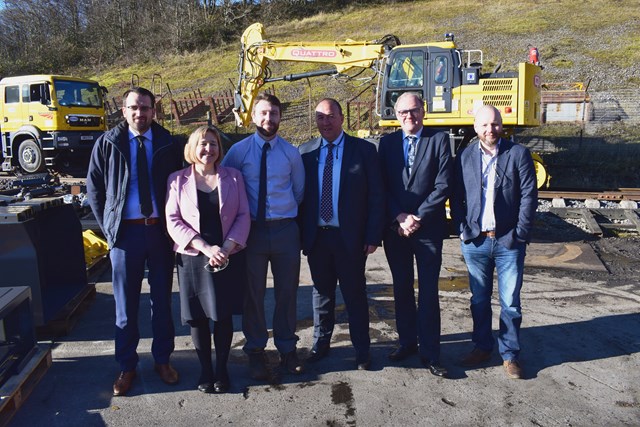 Lynne Neagle AM (second left) with Carl Jones, director of rail engineering, G.O.S (third left) and Wayne Gregory, managing director, G.O.S (third right) and representatives from Network Rail