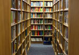 Rows of shelving filled with books.