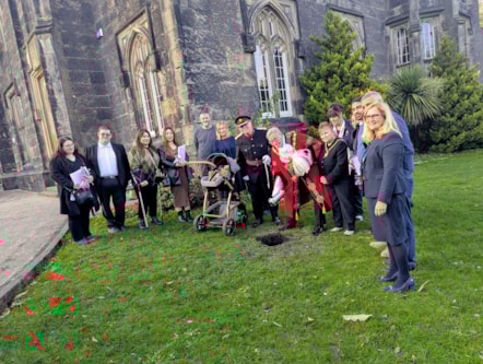 The Mayor of Dudley burying a time capsule at Priory Hall